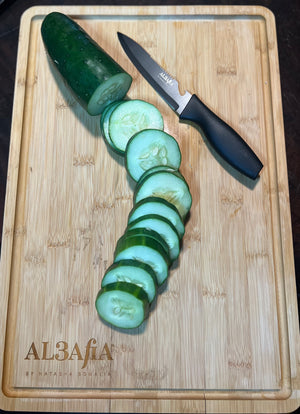 AL3AfiA Signature Bamboo Cutting Board
By Natasha Somalia